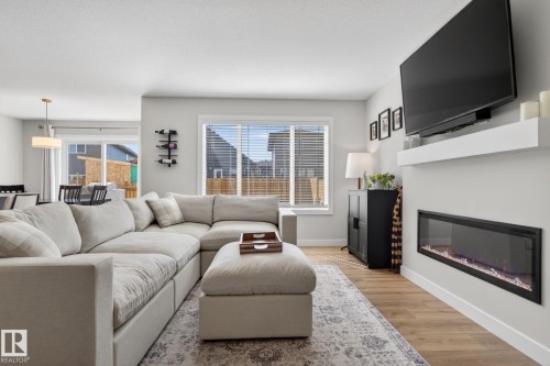 77 Penn Place, Spruce Grove, AB - Indoor Photo Showing Living Room With Fireplace