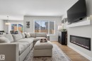 77 Penn Place, Spruce Grove, AB  - Indoor Photo Showing Living Room With Fireplace 
