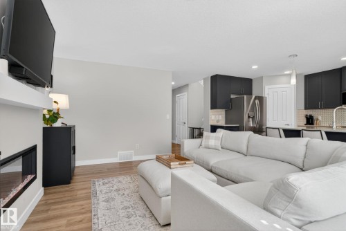 77 Penn Place, Spruce Grove, AB - Indoor Photo Showing Living Room With Fireplace