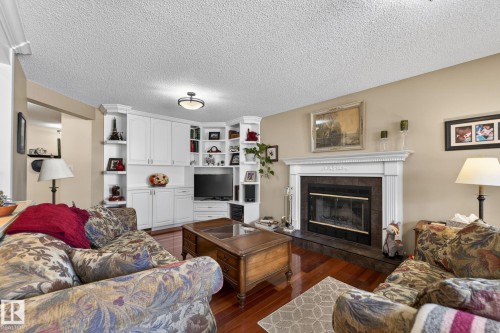 3108 36B Avenue, Edmonton, AB - Indoor Photo Showing Living Room With Fireplace