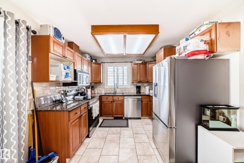 3218 36 Street, Edmonton, AB - Indoor Photo Showing Kitchen With Double Sink