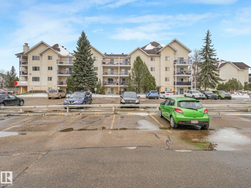 Five-story building featuring balconies and a neutral-toned exterior - 143 10636 120 Street Nw, Edmonton, AB - Outdoor