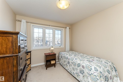 Room featuring light neutral wall paint and carpeting - 1915 126 Street, Edmonton, AB - Indoor Photo Showing Bedroom