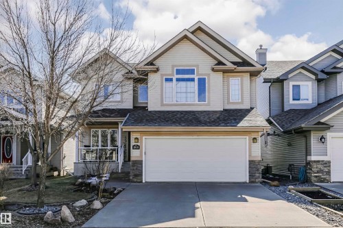 Contemporary two-story residence featuring light-toned siding and a prominent front-facing gable - 1915 126 Street, Edmonton, AB - Outdoor With Facade