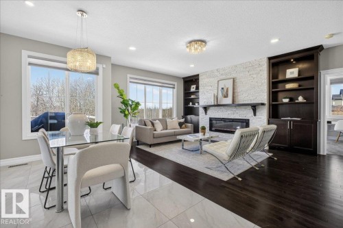 1380 Graydon Hill Way, Edmonton, AB - Indoor Photo Showing Dining Room With Fireplace