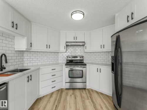4103 28 Avenue, Edmonton, AB - Indoor Photo Showing Kitchen With Double Sink With Upgraded Kitchen