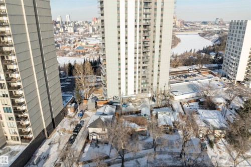 Urban landscape featuring high-rise architecture and a riverfront setting - 10124 88 Avenue, Edmonton, AB - Outdoor