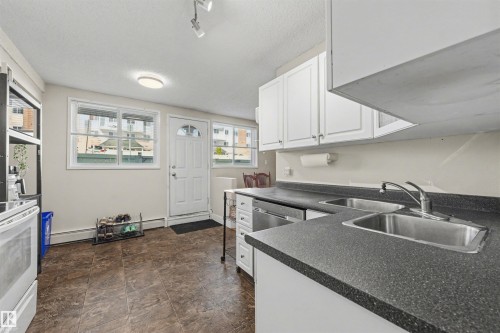 110 14520 52 Street, Edmonton, AB - Indoor Photo Showing Kitchen With Double Sink