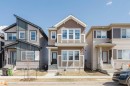 Contemporary two-story residence featuring a combination of horizontal siding and shake siding - 343 Edgemont Drive, Edmonton, AB  - Outdoor With Facade 