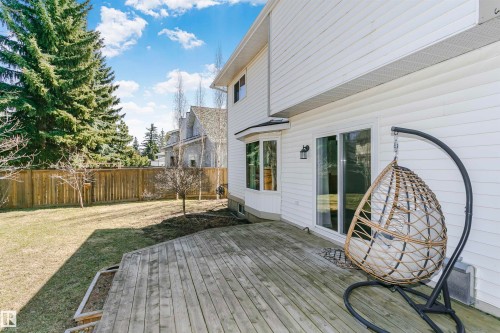 Expansive wooden deck with direct access to the interior via sliding glass doors - 17820 57 Avenue, Edmonton, AB - Outdoor