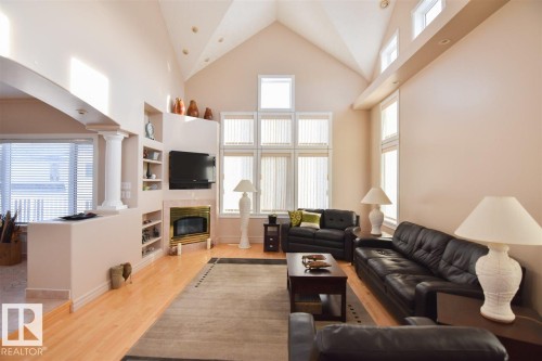 16115 57 Street, Edmonton, AB - Indoor Photo Showing Living Room With Fireplace