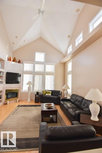 16115 57 Street, Edmonton, AB - Indoor Photo Showing Living Room With Fireplace