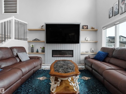 9143 Pear Drive, Edmonton, AB - Indoor Photo Showing Living Room With Fireplace