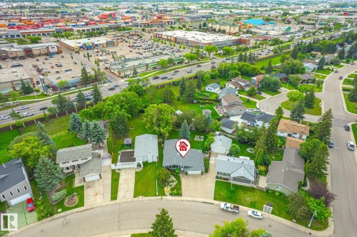 Aerial depiction of a residential neighborhood featuring detached homes on generously sized lots with mature trees - 10339 36A Avenue, Edmonton, AB - Outdoor With View