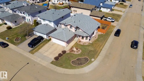 Corner lot residence featuring a two-car garage, an additional single-car garage, and a concrete driveway - 5736 161 Avenue, Edmonton, AB - Outdoor With View