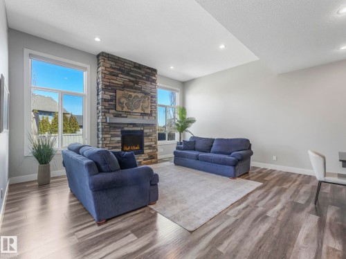 4260 Charles Close, Edmonton, AB - Indoor Photo Showing Living Room With Fireplace
