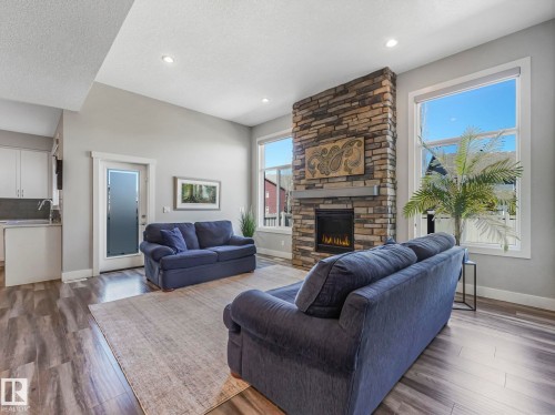 4260 Charles Close, Edmonton, AB - Indoor Photo Showing Living Room With Fireplace