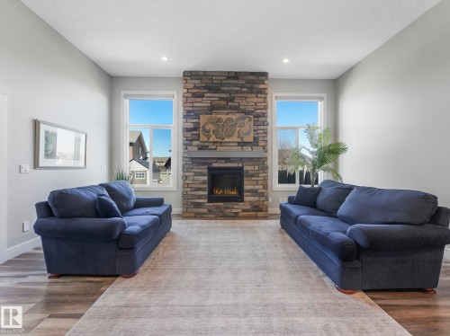 4260 Charles Close, Edmonton, AB - Indoor Photo Showing Living Room With Fireplace