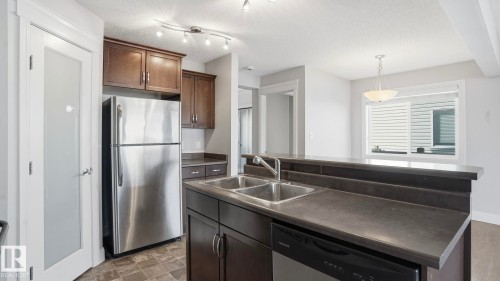7 Ashby Gardens, Spruce Grove, AB - Indoor Photo Showing Kitchen With Double Sink