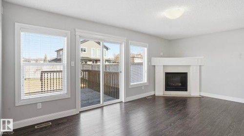 7 Ashby Gardens, Spruce Grove, AB - Indoor Photo Showing Living Room With Fireplace