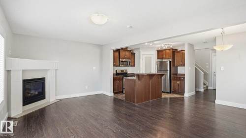 7 Ashby Gardens, Spruce Grove, AB - Indoor Photo Showing Other Room With Fireplace