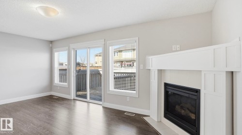 7 Ashby Gardens, Spruce Grove, AB - Indoor Photo Showing Other Room With Fireplace