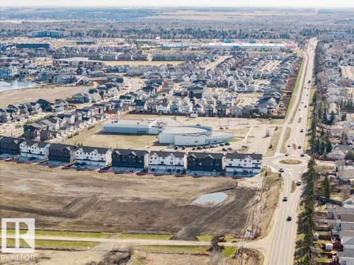 Aerial perspective showcasing a residential community with varied housing styles - 7 Doucette Place, St. Albert, AB - Outdoor With View