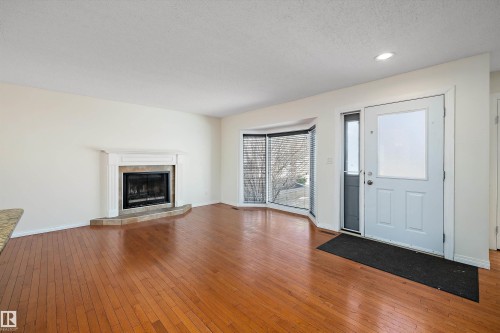 115 Walker Road, Edmonton, AB - Indoor Photo Showing Living Room With Fireplace