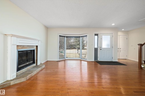 115 Walker Road, Edmonton, AB - Indoor Photo Showing Living Room With Fireplace