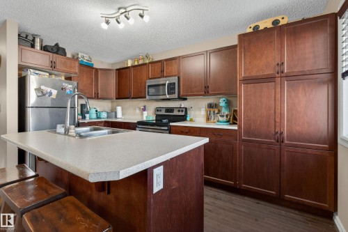 5636 18 Avenue, Edmonton, AB - Indoor Photo Showing Kitchen With Stainless Steel Kitchen With Double Sink