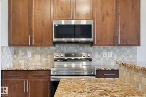 171 Keyport Circle, Leduc, AB - Indoor Photo Showing Kitchen With Upgraded Kitchen