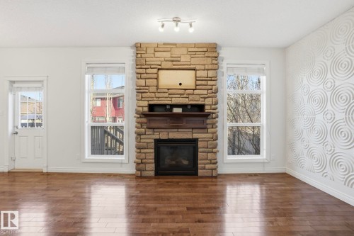171 Keyport Circle, Leduc, AB - Indoor Photo Showing Living Room With Fireplace