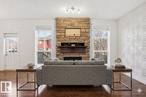 171 Keyport Circle, Leduc, AB - Indoor Photo Showing Living Room With Fireplace