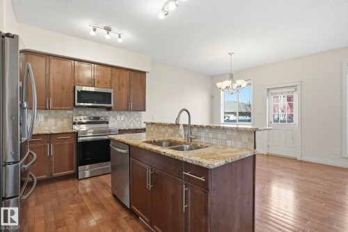 171 Keyport Circle, Leduc, AB - Indoor Photo Showing Kitchen With Double Sink