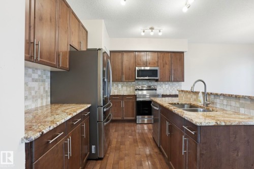 171 Keyport Circle, Leduc, AB - Indoor Photo Showing Kitchen With Double Sink With Upgraded Kitchen