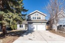 Two-story residence featuring gray siding and a two-car attached garage - 6016 177 Street, Edmonton, AB  - Outdoor 