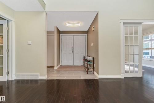 Entryway featuring double panel doors, recessed lighting, and tile flooring - 6016 177 Street, Edmonton, AB - Indoor Photo Showing Other Room