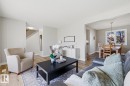 Open-concept living area with wood-finish flooring - 17604 85 Avenue, Edmonton, AB  - Indoor Photo Showing Living Room 