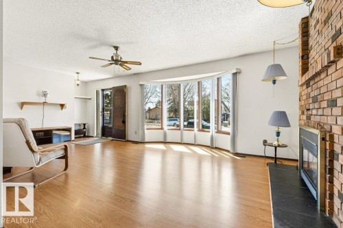 35 Oatway Drive, Stony Plain, AB - Indoor Photo Showing Other Room With Fireplace