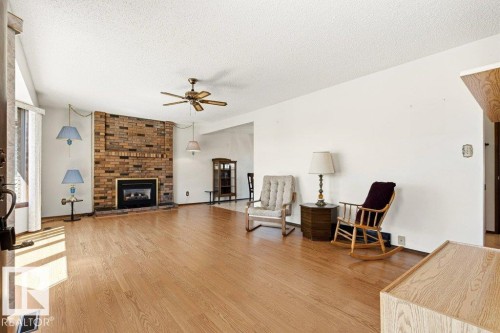 35 Oatway Drive, Stony Plain, AB - Indoor Photo Showing Living Room With Fireplace