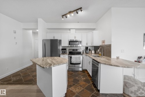 205 10011 110 Street, Edmonton, AB - Indoor Photo Showing Kitchen With Stainless Steel Kitchen With Upgraded Kitchen