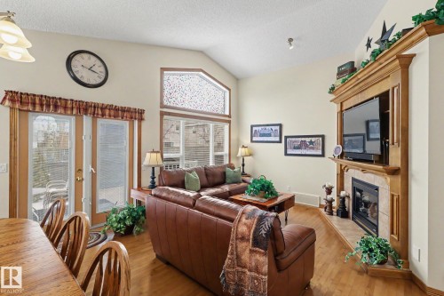 5 Richelieu Place, Beaumont, AB - Indoor With Fireplace