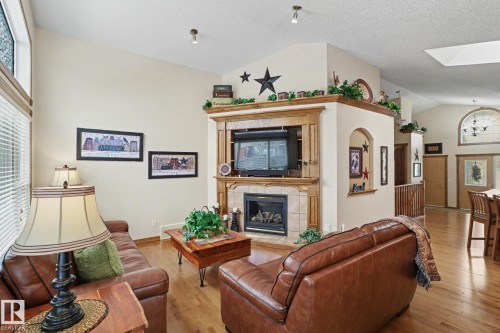 5 Richelieu Place, Beaumont, AB - Indoor Photo Showing Living Room With Fireplace