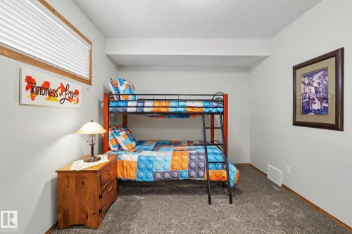 5 Richelieu Place, Beaumont, AB - Indoor Photo Showing Bedroom