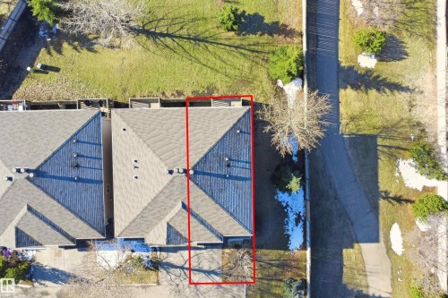 Pitched roofline residential property featuring asphalt shingles - 19 15151 43 Street, Edmonton, AB - Outdoor