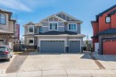 Two-story residential architecture with light gray siding and dark gray trim - 731 57 Street Sw, Edmonton, AB  - Outdoor With Facade 