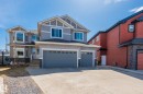 Contemporary two-story residence featuring light gray siding and stone accents - 731 57 Street Sw, Edmonton, AB  - Outdoor With Facade 
