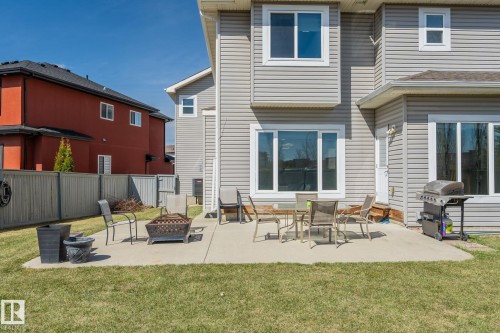 Expansive concrete patio with direct access to the interior - 731 57 Street Sw, Edmonton, AB - Outdoor With Exterior