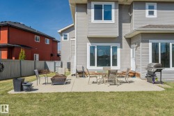 Expansive concrete patio with direct access to the interior - 
