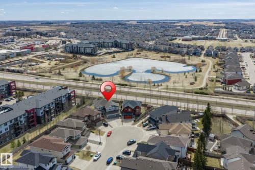 Aerial perspective showcasing a residential cul-de-sac with surrounding properties - 731 57 Street Sw, Edmonton, AB - Outdoor With View